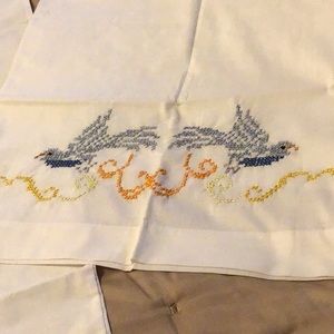 Hand cross stitched pillowcases pair